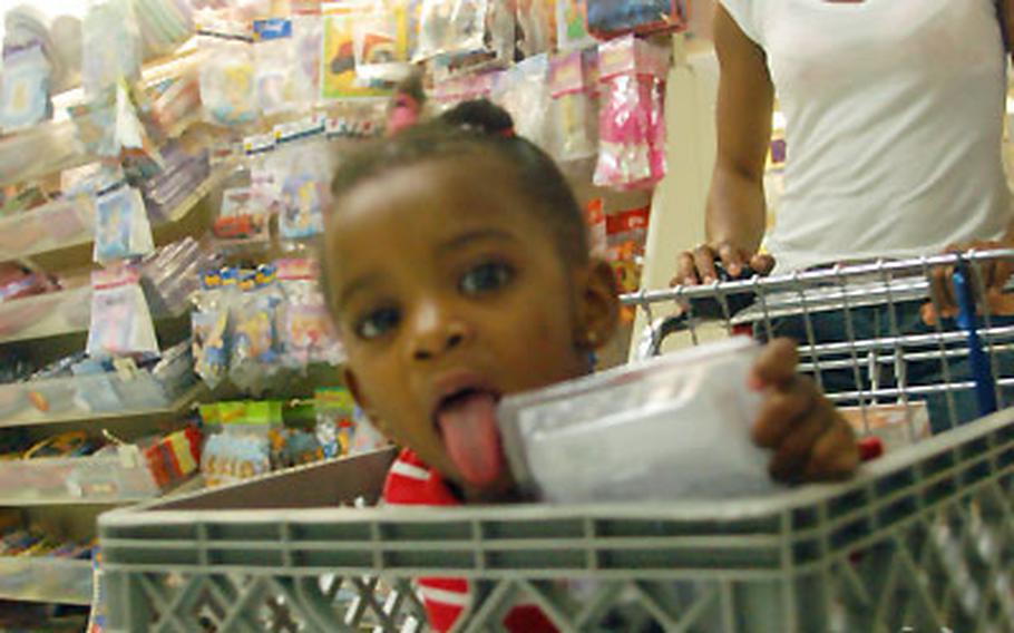 Nathalie Coulibaly and her daughter, 18-month-old Rahima, said her husband’s current deployment has been easier on her than his first, since she has met people and developed a support group. Nathalie is married to Staff Sgt. Brahima Coulibaly of Battery A, 1st Battalion, 7th Field Artillery Regiment, who is based in Baghdad.