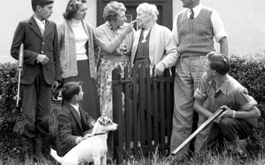 The Pilgrim family: In front, Roy, 7, and Keith, 17; in back, Dudley, 14, Jill, 20, Mrs. Pilgrim, Grandma Cross, D.E.