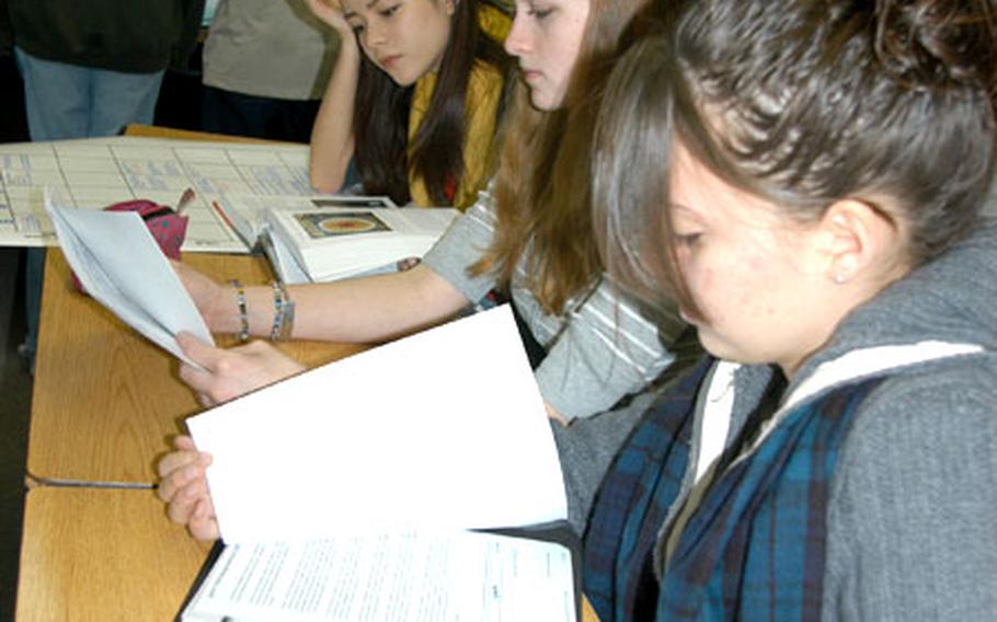 Robert D. Edgren High School seniors, from left, Emely Vallee,Samantha Cannon and Stephanie Wehrung study Friday morning at school. Vallee and Cannon formed the Gay-Straight Alliance at Edgren this fall. Wehrung is a member and has helped Cannon and Vallee promote the group.