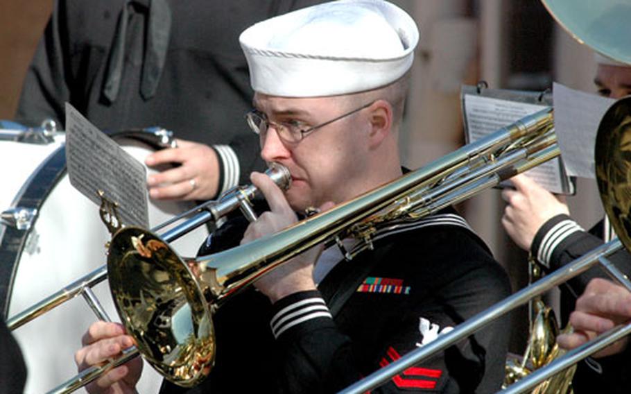 Petty Officer 2nd Class Michael Donaldson of the Naval Forces Europe-6th Fleet Band plays Friday during the base closure ceremony of Naval Support Activity La Maddalena, on the Italian island of Sardinia.