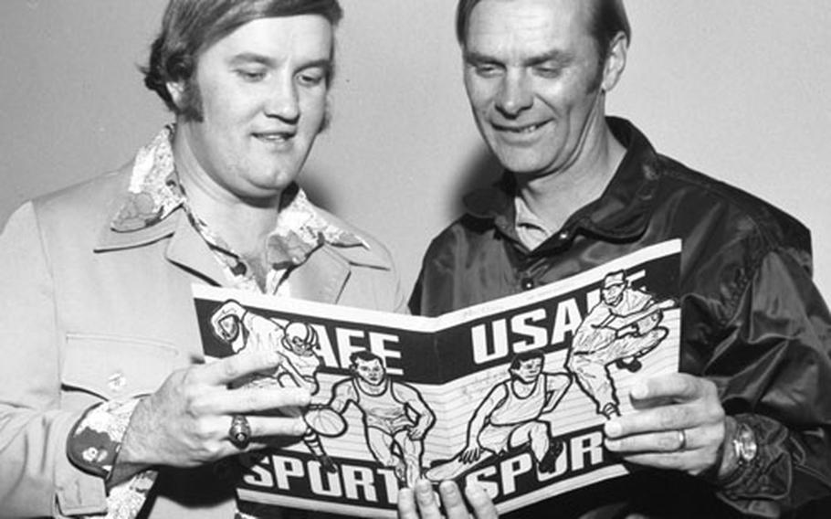 1976 USAFE baseball clinic instructors Larry Barnett, left, and University of Arizona coach Jerry Kindall.