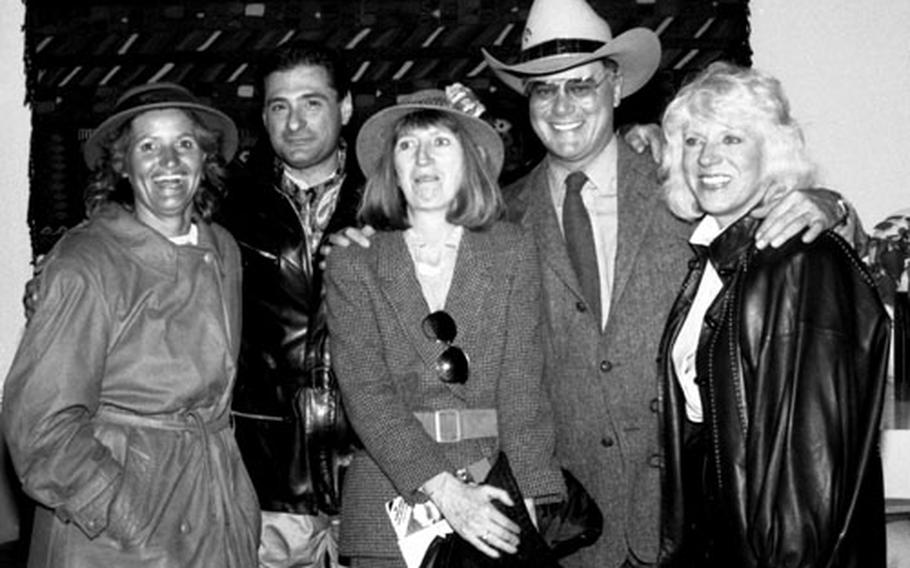 Larry Hagman, star and chief villain of the popular  TV series, meets some of his fans after arriving at the Frankfurt airport in April, 1983.