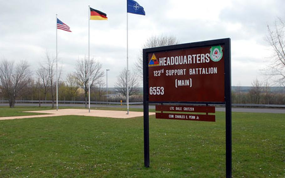 U.S., German and NATO flags fly over Anderson Barracks on the outskirts of Dexheim, Germany. The only unit stationed at here, the 123rd Main Support Battalion, is inactivating in June.