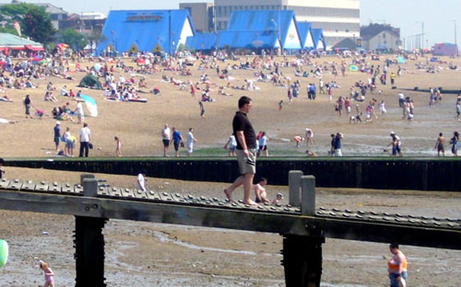 Sunbathers crowd a sandy beach in Southend-on-Sea on a recent weekend.