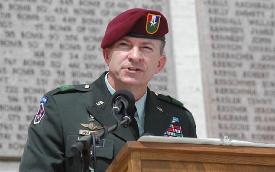 Brig. Gen. William Garrett, commanding general of Southern European Task Force (Airborne), addresses several hundred people who visited the Florence, Italy, American Cemetery and Memorial for a Memorial Day observance.