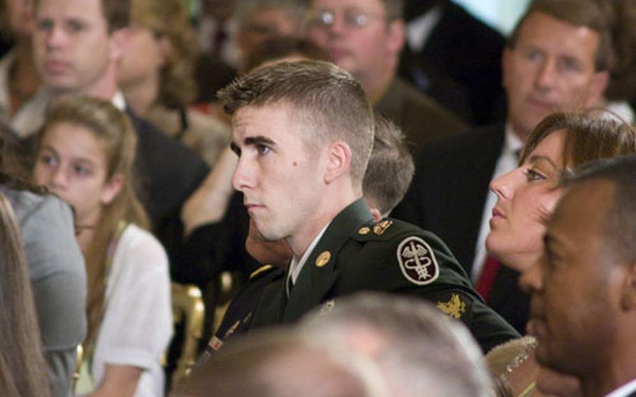 Among those on hand to witness Monday&#39;s ceremony was Spc. Sean Lawson, one of the soldiers Pfc. Ross McGinnis protected by falling on the grenade.