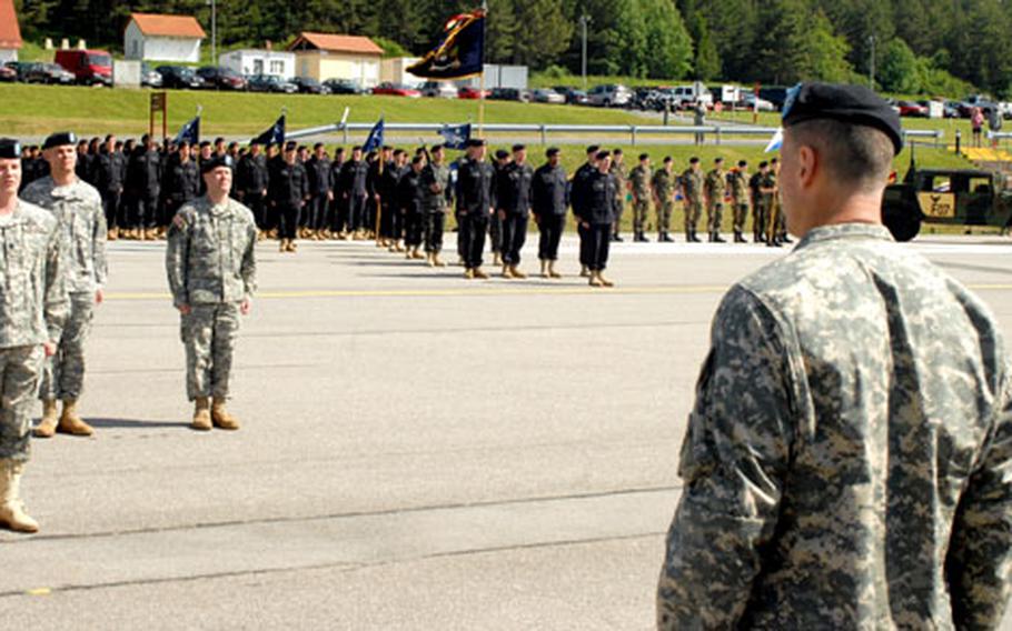 Col. Thomas Vandal, outgoing chief of the Joint Multinational Readiness Center Operations Group, bids farewell to Hohenfels-based U.S. soldiers and German troops during a ceremony on Friday.