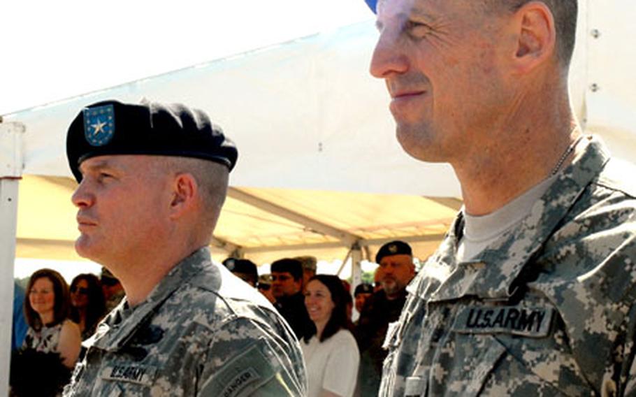 Col. Thomas Vandal, right, outgoing chief of the Joint Multinational Readiness Center Operations Group, and Brig. Gen. David Hogg, chief of the Joint Multinational Training Command, spoke at a farewell ceremony on Friday.