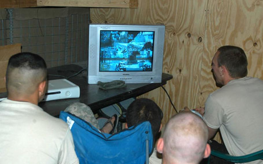 Up for four soldiers can play video games at a time on a TV set in the platoon’s MWR building.