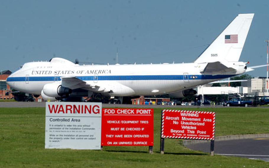 Airmen coming to work Monday at RAF Mildenhall, England, might have thought Air Force One had landed at the base. Instead, it was a National Air Operations Center 747, and base officials would not comment on wether the plane&#39;s arrival had anything to do with President Bush&#39;s upcoming trip to Europe.