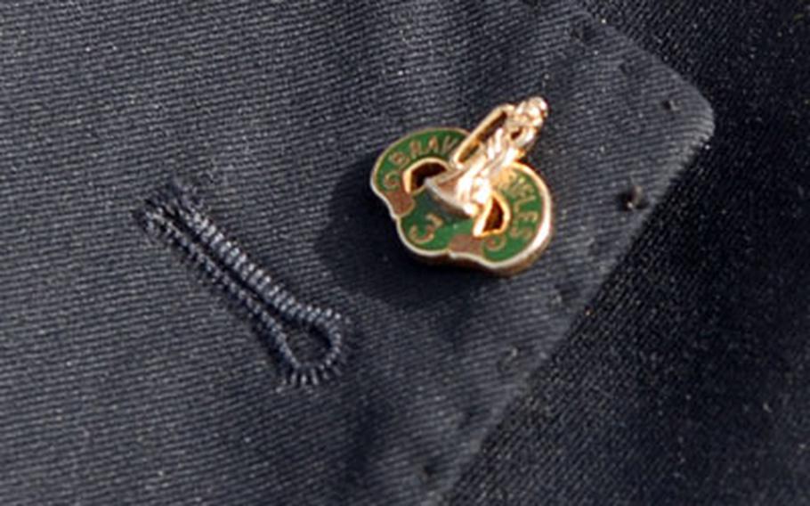 A pin with the insignia of the 3rd Armored Cavalry Regiment is tacked to the lapel of Najim Abdullah Al Jabouri. The Tal Afar mayor has had an special liking for the unit ever since they cleared his city during vicious fighting in 2005. He even returned to the states to speak with soldiers at their permanent duty station.