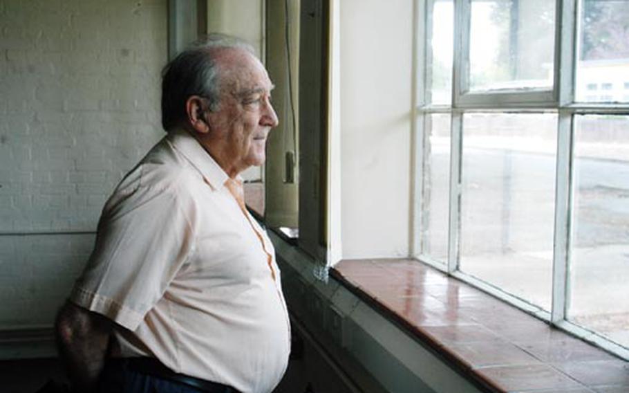 Jack Wernette gazes out a window of his old classroom in the now-closed London Central High School. The 83-year-old taught English and drama at the school for 25 years until he retired in 1993.