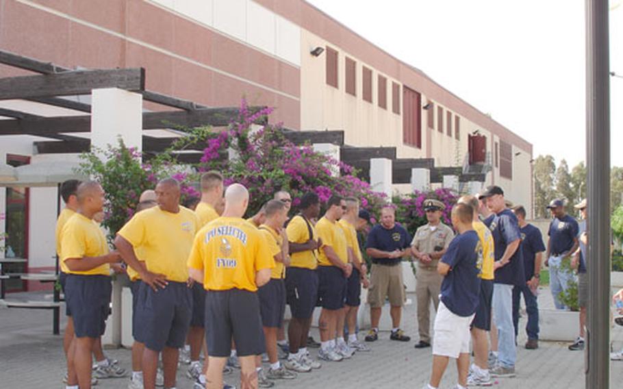 Chief petty officer selectees receive their assignments Tuesday as the group volunteered to get Sigonella’s new elementary school ready for opening day on Thursday.