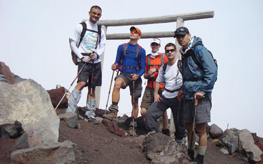 Yokosuka Naval Base, Japan, climbers Mike Raney, Luke Nelson, Justin Hoff, Doug Szwarc and Rob Lovern tackled Mount Fuji on Labor Day with the intention of climbing Japan&#39;s tallest mountain four times in 24 hours. All, with the exception of Lovern who climbed three times with hurt feet, made the climbs in 22 hours to raise money for charity.