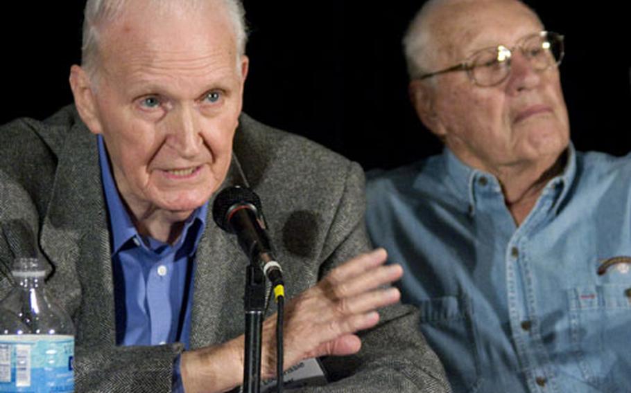 Lou Brissie, who was badly wounded in World War II but recovered to win 44 games as a big-league pitcher, speaks during a session on Baseball and World War II at the American Veterans Center&#39;s annual conference in Washington, D.C. At right is Hall of Fame pitcher Bob Feller.