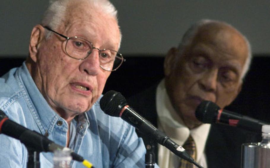 Baseball Hall of Famers Bob Feller, left, and Monte Irvin at a panel discussion on Baseball and World War II at the American Veterans Center&#39;s annual conference.