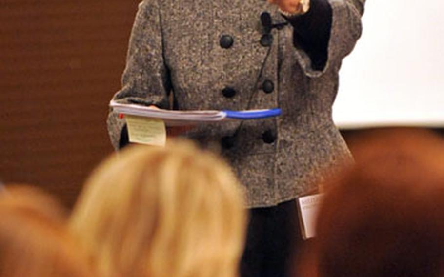 Patty Shinseki makes a point during a training class called Living in the New Normal: Supporting Children through Trauma and Loss at Ramstein, Germany, on Monday. The two-day class was attended by Army, Air Force and Department of Defense Dependents Schools educators and counselors. Shinseki is the wife of retired Gen. Eric Shinseki. the former chairman of the Joint Chiefs of Staff.