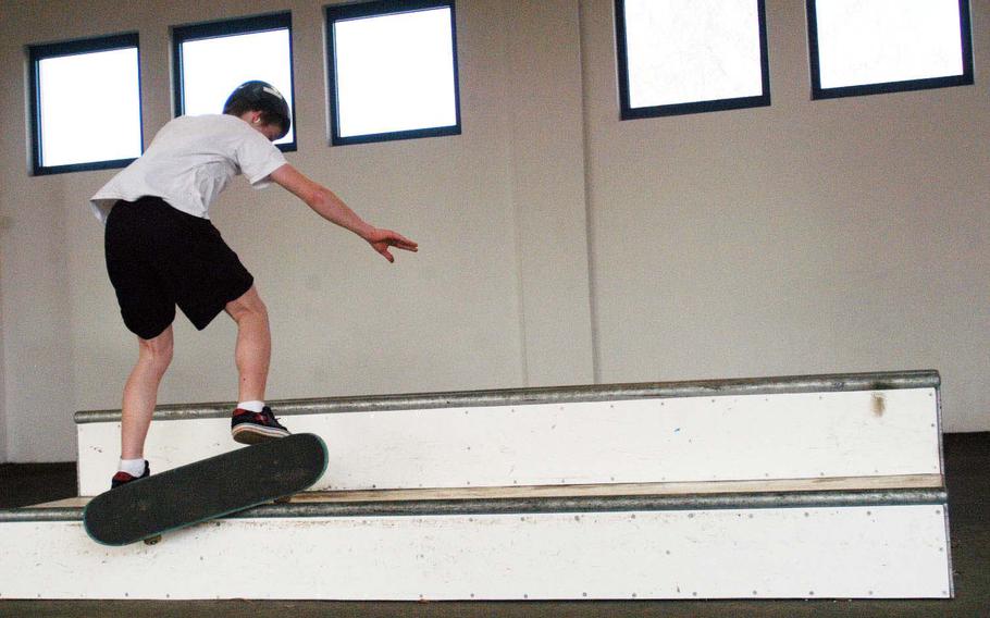 Garold Largent, 15, grinds across a box before the third annual skateboard competition at Baumholder. He has won the past two years.