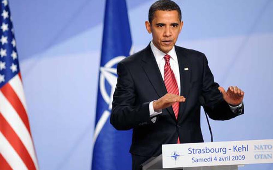 President Barack Obama answers a question Saturday at a news conference following the NATO summit in Strasbourg, France.
