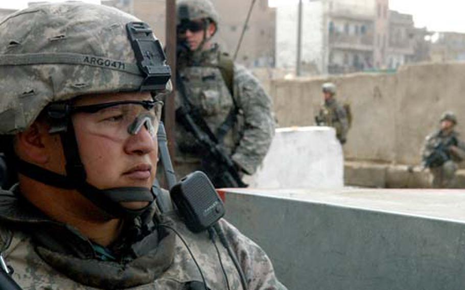 Sgt. 1st Class Richard Gonzalez, of Alpha Troop, 5th Squadron, 37th U.S. Cavalry Regiment, waits to move out during a patrol.