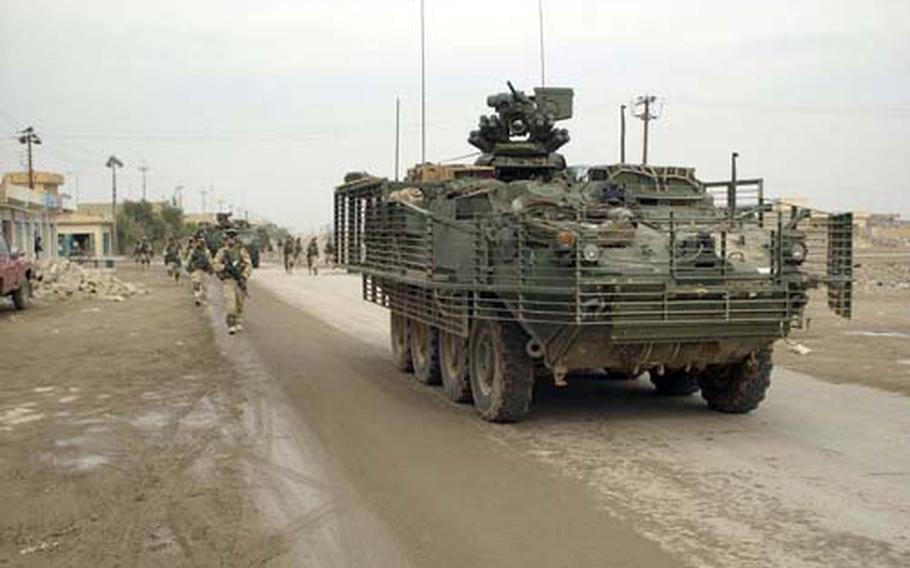 Soldiers of Battle Company, 5th Battalion - 20 Infantry, 3rd Brigade, 2nd Infantry Division (Stryker Brigade Combat Team) conduct route reconnaissance, a presence patrol, a civilian assessment, and combat operations contributing to the stability of Samarra, Iraq on December 15, 2003. The 3rd Brigade, 2nd Infantry Division (Stryker Brigade Combat Team) is under the operational control of the 4th Infantry Division. (U.S. Army photo by Spc. Clinton Tarzia) (Released)