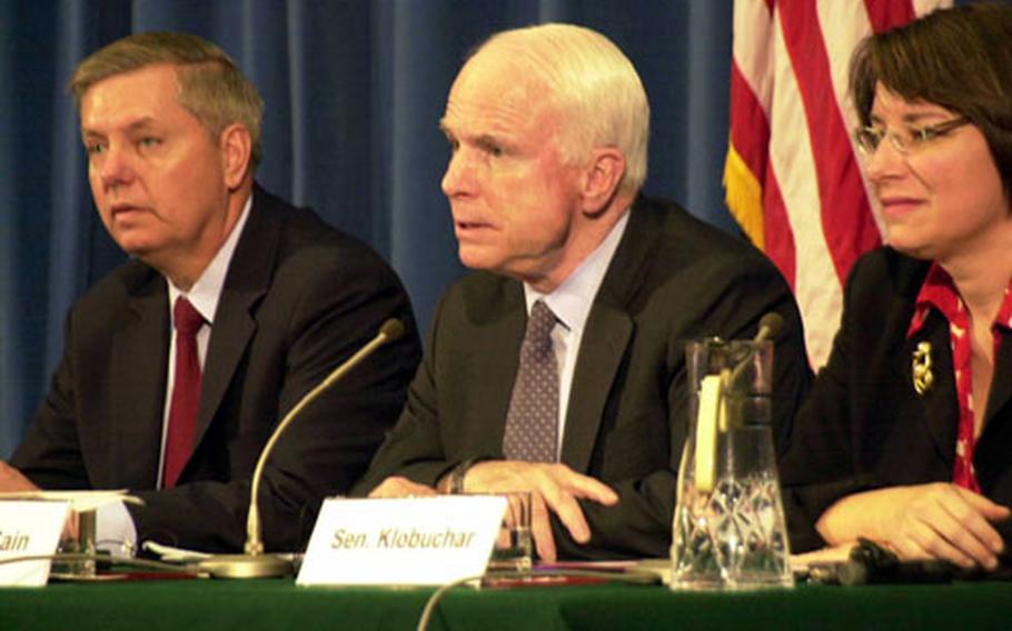 From left, U.S. Sens. Lindsey Graham, John McCain and Amy Klobuchar hold a news conference Friday during their trip to Japan. “The latest launch by the North Koreans is a direct violation of U.N. Security Council resolutions and against the norms of decent behavior as a citizen of the world,” McCain, R-Ariz, said.