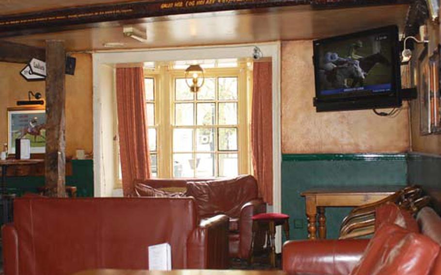 The Waggon & Horses has outdoor curbside seating, a simple menu and a rustic interior.