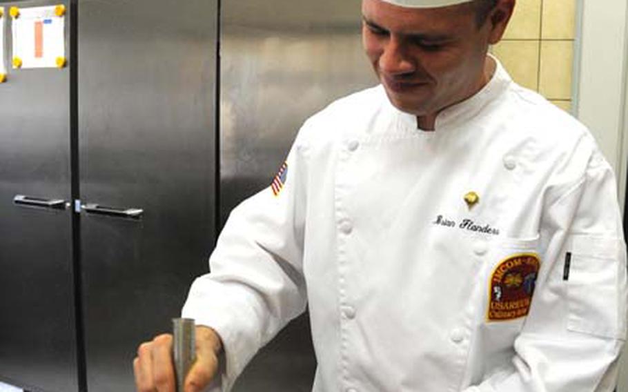 Spc. Brian Flandress mixes up a honey-mustard vinaigrette in the Keyes Building kitchen on Campbell Barracks in Heidelberg, Germany.