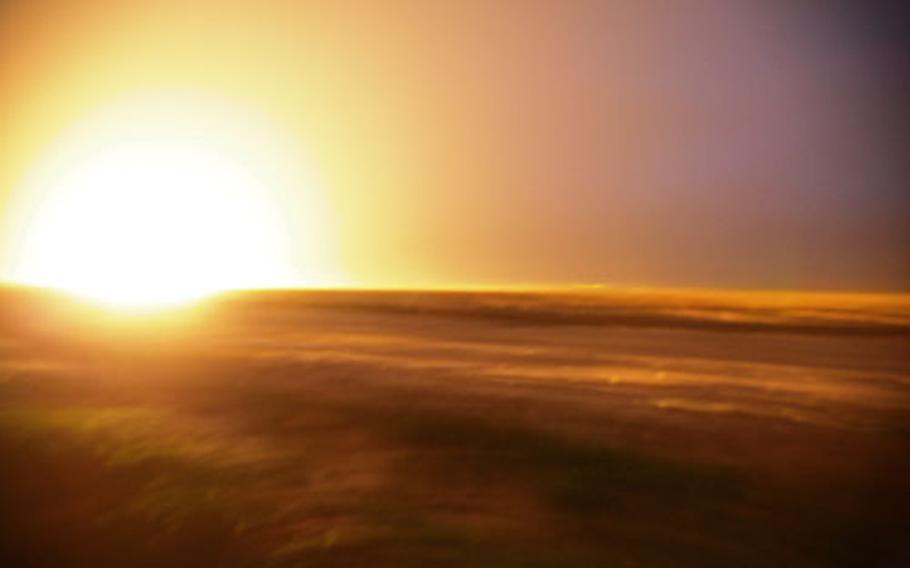 A 500-pound bomb dropped from a B-1 bomber lights up the night horizon near Mira Hor. U.S. soldiers with Company A, 2nd Battalion, 2nd Infantry Regiment, called in the airstrike after being ambushed twice by Taliban fighters as they were leaving the village, where they had found and destroyed a cache of explosives.