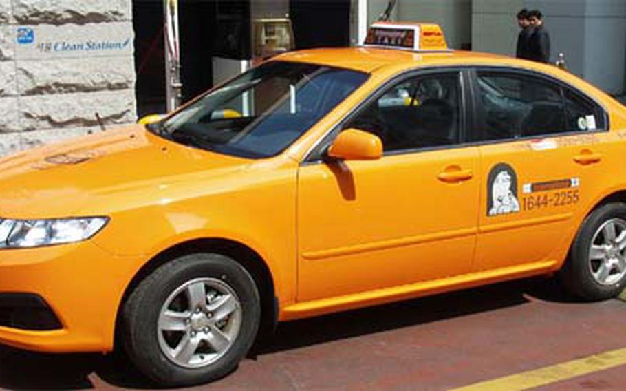 Seoul’s new “international taxis,” which offer scheduled pickups and translation services, have solid orange bodies. Regular cabs in Seoul are white with an orange pattern.