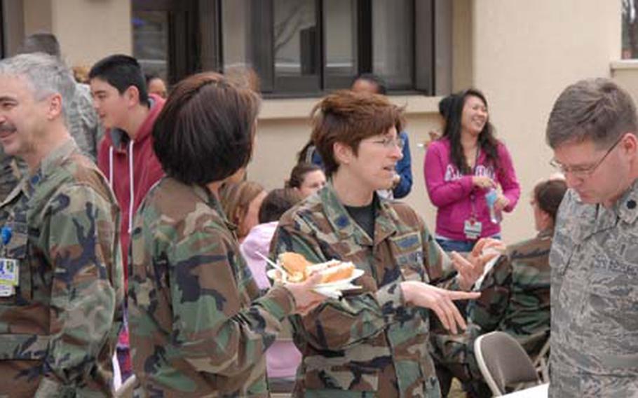Members of the 35th Medical Group enjoy a barbecue on April 10 after concluding three concurrent inspections at Misawa Air Base, Japan.