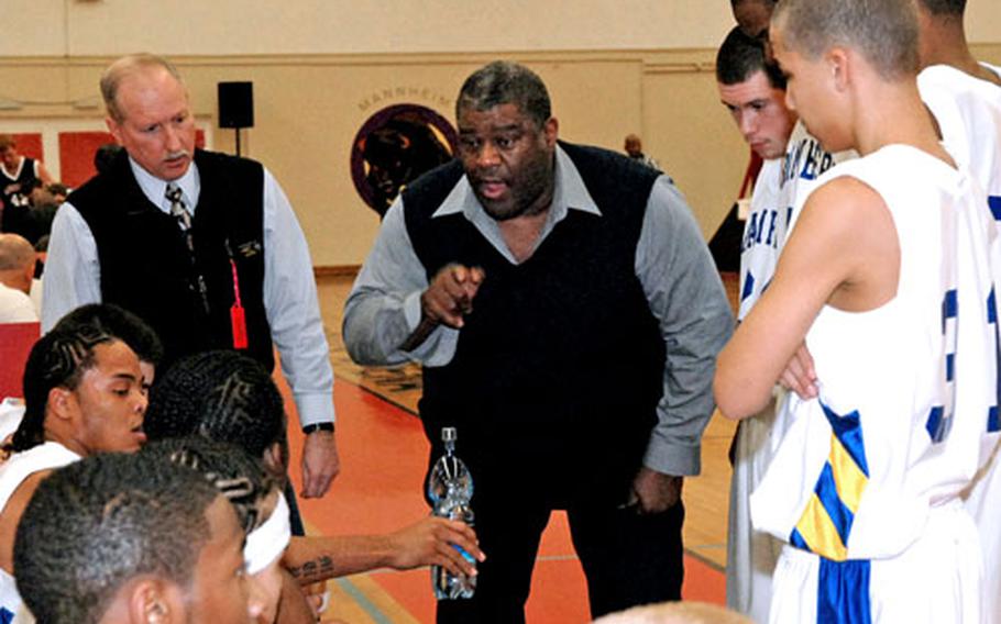 Bamberg (Germany) High School boys&#39; basketball coach Charles E. "Chuck" Jordan, center, talks to his team during a timeout in the 2007 Division IV final against Menwith Hill. Jordan died in February 2008, of complications from surgery.