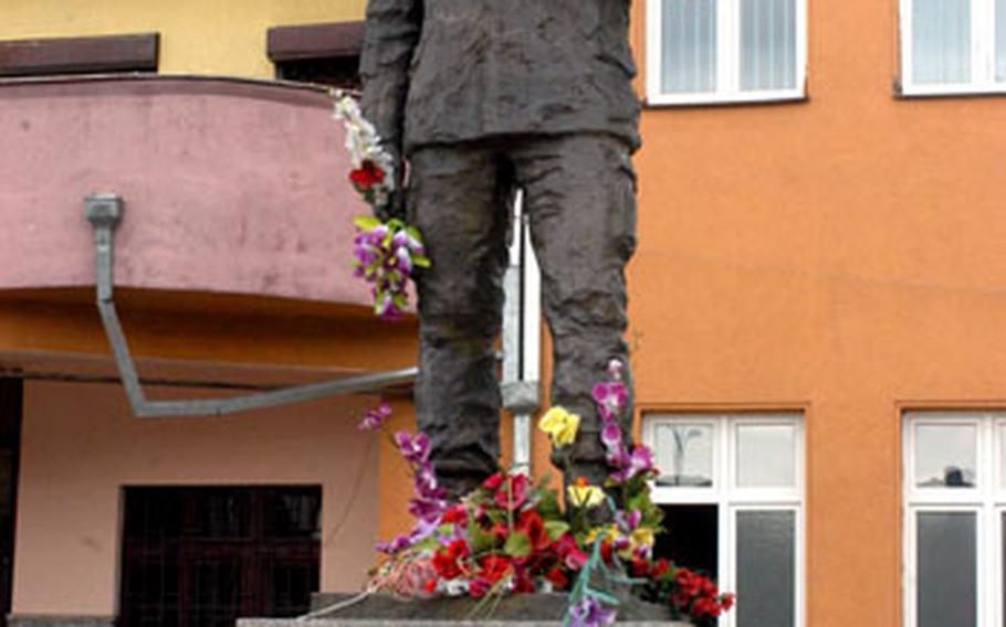 This statue of Agim Ramadani stands in a prominent position in downtown Gnjilane. Ramadani was an ethnic Albanian who was a member of the Serbian army before fighting broke out in Kosovo. He left the army and was later killed fighting for rebel forces. Such statues and memorials honoring those killed a decade ago are located all over Kosovo.