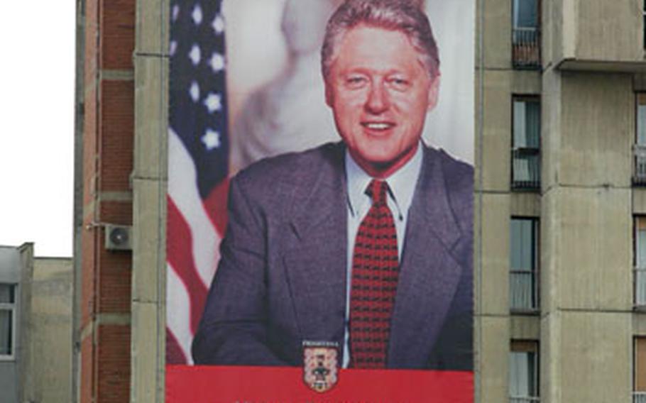 U.S. troops — and political leaders such as former President Bill Clinton — are popular in Kosovo, a country where U.S. troops have been serving a decade. This billboard of Clinton is posted above the street bearing his name in the capital of Pristina.