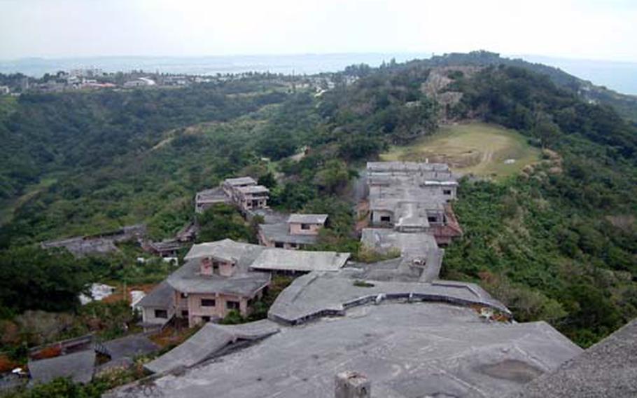 The ruins of the allegedly haunted Royal Hotel sprawl over a hillside Buddhist monks claim is the dwelling place of restless spirits.