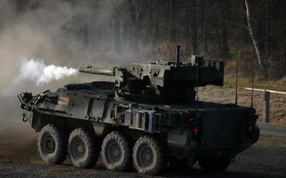 A 2nd Stryker Cavalry Regiment Mobile Gun System fires a round during a demonstration Thursday at Grafenwoehr Training Area on Thursday. The MGS turret is the same as the one mounted on an M1A1 Abrams tank.