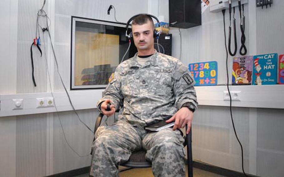 Army Sgt. 1st Class David McGuire waits for the hearing-test portion of his exam to begin at Landstuhl Regional Medical Center in Germany last month. McGuire is from Headquarters and Headquarters Company, 170th Infantry Brigade Combat Team (Heavy) at Baumholder, Germany.