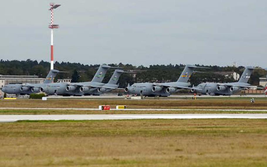 A flock of C-17 Globemaster IIIs sits on the flight line at Ramstein Air Base, Germany. Ramstein and Air Base will see an increase in heavy-lift operations starting in early February, due to the troop increases in Afghanistan.