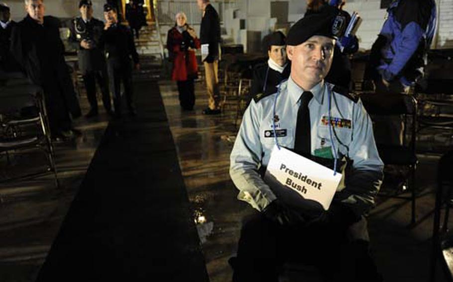 U.S. Army Sgt. Bruce Cobbledick of the Armed Forces Inaugural Committee (AFIC), playing the role of President George W. Bush, waits for the rehearsal of the 56th Presidential Inauguration to begin in Washington, D.C., Jan. 11, 2009.