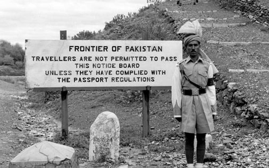 A militiaman from the Khyber Rifles stands guard at the Khyber Pass in 1958.