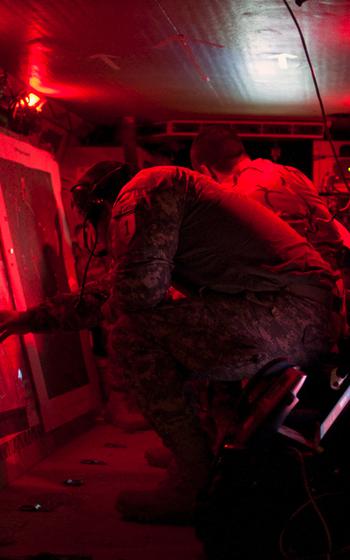 U.S. soldiers monitor an April 23 security sweep in Tikrit from a mobile operations center. Though the Americans were involved in planning the operation and monitored with a reconnaissance drone, no American troops were directly involved in the sweep.