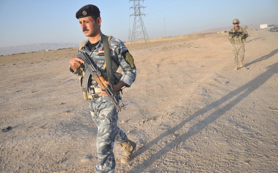 Iraqi and American soldiers patrol outside of Mosul. Formerly called “combat patrols,” the movements are now referred to as “stability operations” in line with President Barack Obama’s pledge to end combat operations by the end of August.