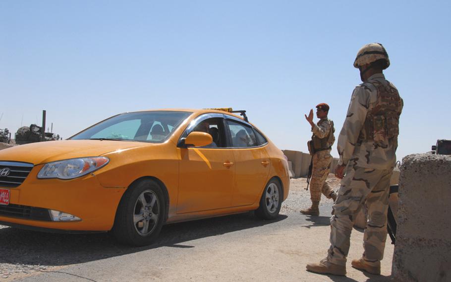 Soldiers for the Kurdistan Regional Government, the Iraqi army and the U.S. Army man 23 trilateral checkpoints in the Combined Security Area, disputed lands between the Arabs and the Kurds that cut through three provinces in Iraq's north. Leaders from the three groups began standing up the trilateral checkpoints in January to relieve tensions in the area so that Peshmerga soldiers could search with Kurdish travelers passing through and Iraqi troops could inspect Arabic ones. Most of all, the effort is meant to dampen tensions among the two militaries themselves, as the country works toward enveloping the Kurdish forces into the Iraqi military system.