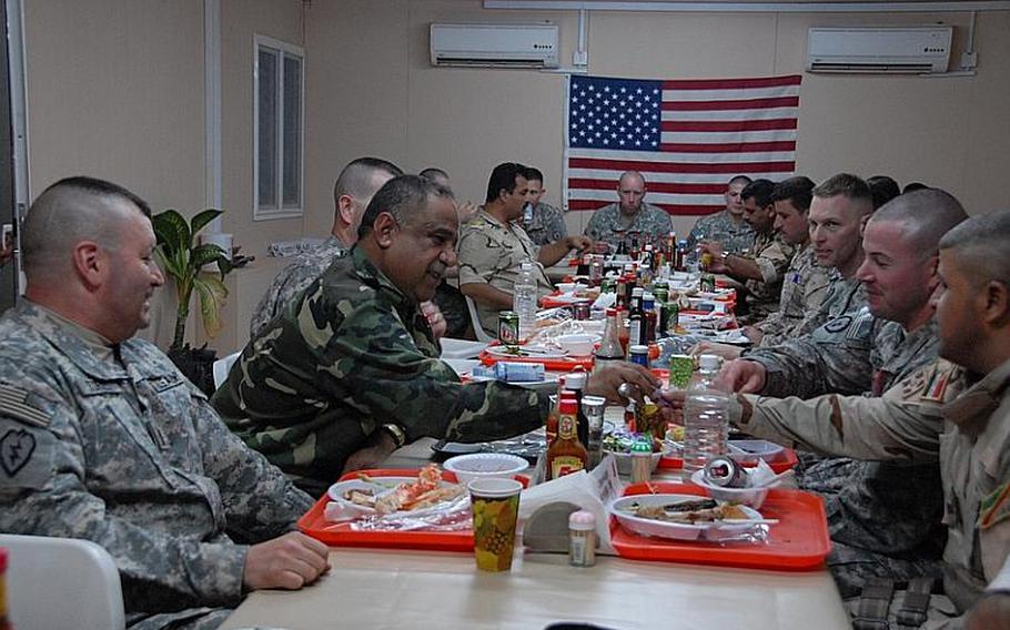 Back at the Eid feast, soldiers from all three units share ice cream and off-color jibes, normal banter in a job so far from wives and family. The U.S. dining hall served surf and turf for the celebration, steak and crab legs usually reserved for Sunday dinner. Most of the Iraqis stuck to steak or hamburgers.