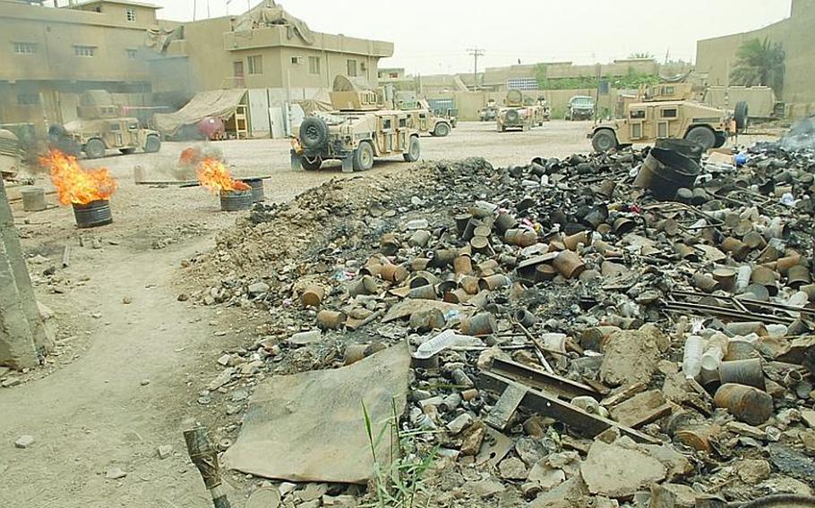 The burn pit at a combat outpost in Baghdad in 2008 shows the amount and types of trash being openly burned at even the smallest U.S. bases in Iraq.  A Government Accountability Office report released this month found that the Department of Defense has not been enforcing its own rules for operating burn pits in Iraq and Afghanistan.