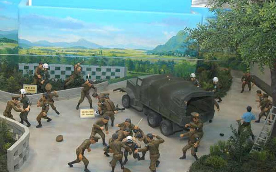 In a display at the new Joint Security Area Visitor Center at Korea&#39;s Demilitarized Zone, figurines depict the Aug. 18, 1976 "Axe Murder Incident" in which two U.S. soldiers were killed and nine other Americans and South Koreans were injured.