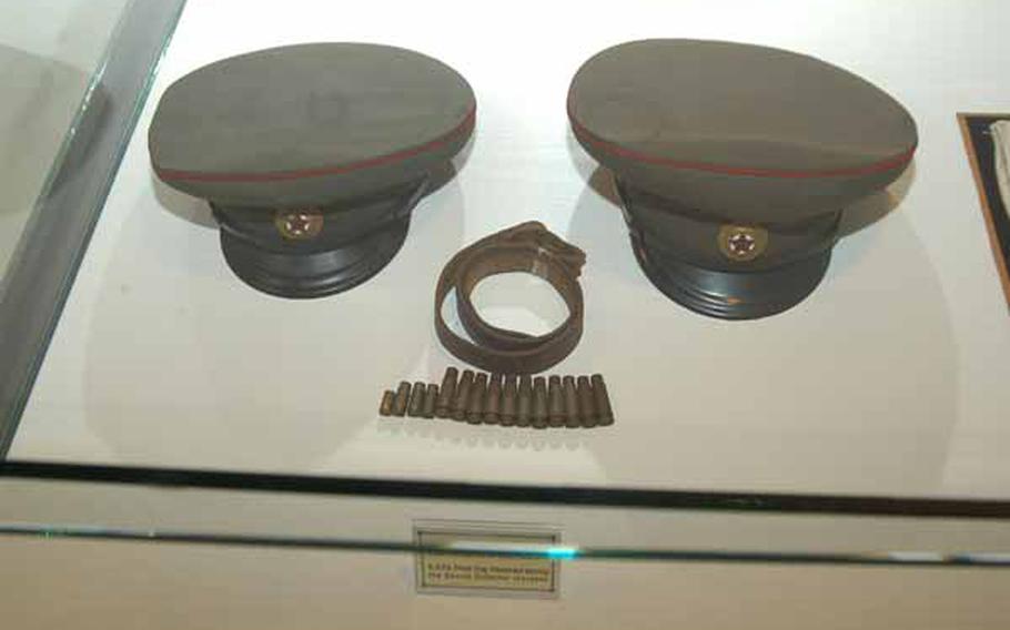 On display at the recently opened Joint Security Area Visitor Center at Korea&#39;s Demilitarized Zone are the hats of North Korean soldiers involved a Nov. 23, 1984 incident at the DMZ during which a Soviet citizen tried to defect and three North Korean soldiers and one South Korean soldier were killed in the ensuring firefight.
Casings from the rifles and pistols fired that day are also on display.
