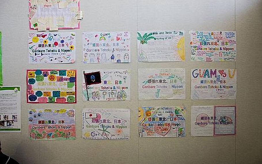Messages of hope from school children in Guam were posted to the wall of Sendai Airport the day it reopened following the March 11 tsunami.