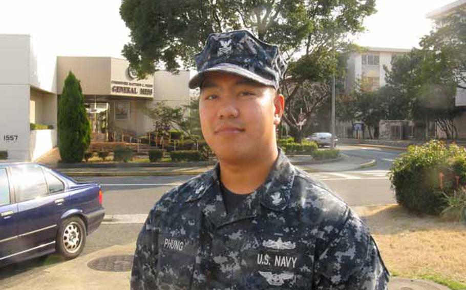 Petty Officer 2nd Class Vu Phung says he hopes his overseas assignment at Yokosuka Naval Base will help his promotion chances. He has an uphill climb -- a combination of overmanning and a precipitous drop in retirements and separations meant that less than 2 percent of sailors in his career field were promoted last fall.