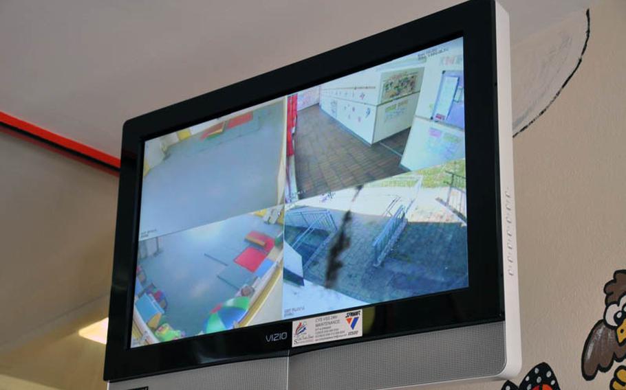 A video screen monitor is on display inside the entrance to the Child Development Center on Askern Manor in Schweinfurt, Germany.